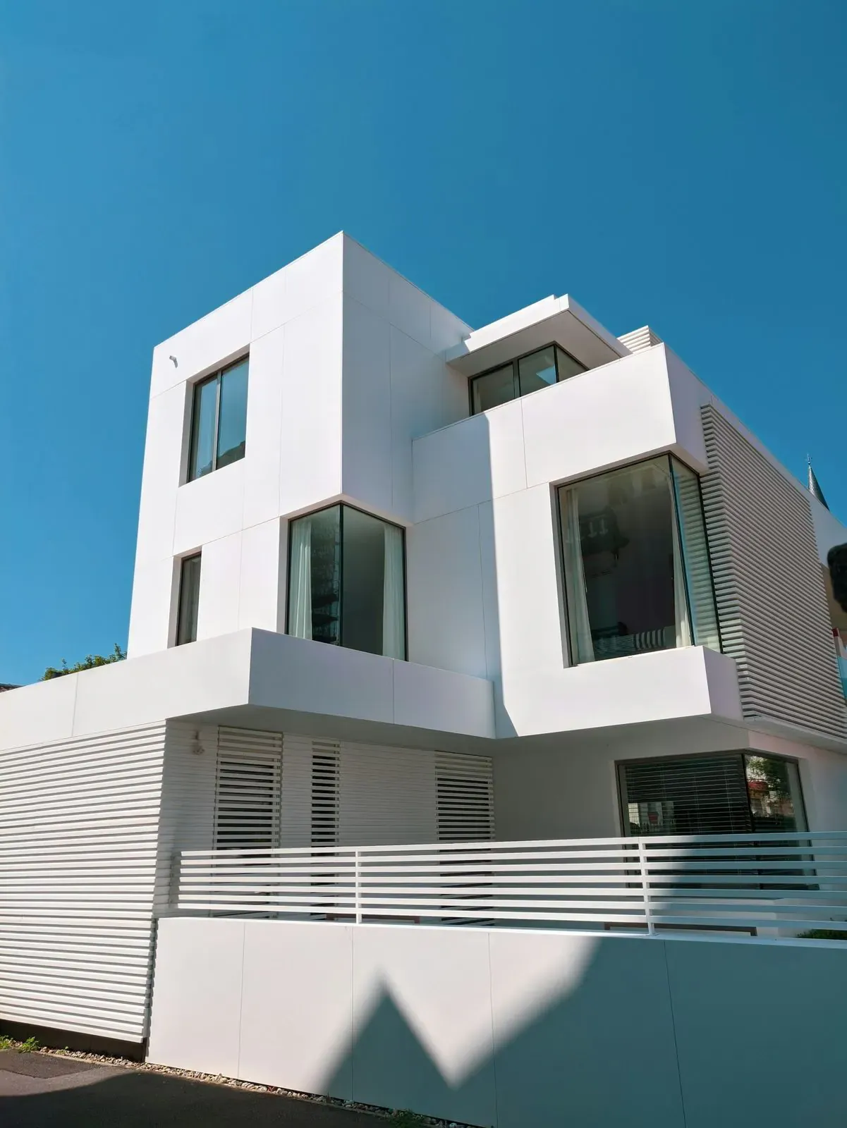 Hillside residence seen from the approach road