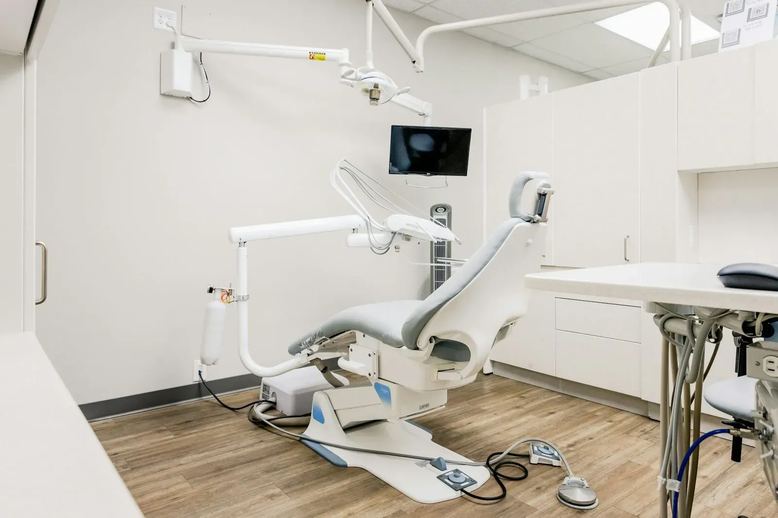 Treatment bay with the chair beside the window